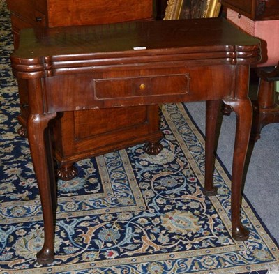 Lot 1374 - A George II Mahogany Triple Foldover Card Table, mid 18th century, of rectangular shaped form...