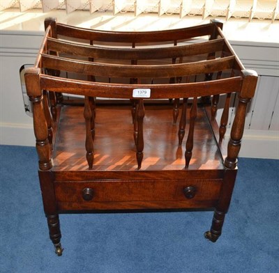 Lot 1379 - A Late George III Mahogany Canterbury, circa 1820, with four concave shaped dividers and...