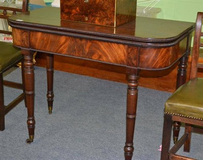 Lot 1380 - A Regency Mahogany Foldover Tea Table, 2nd quarter 19th century, of rounded rectangular form...