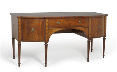 Lot 1382 - A George III Mahogany, Satinwood and Marquetry Breakfront Sideboard, late 18th century, the central