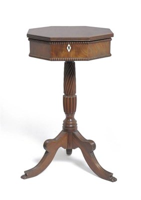 Lot 1387 - A George IV Mahogany Sewing Table, 2nd quarter 19th century, of octagonal shaped form with...