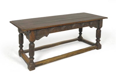 Lot 1389 - A Joined Oak Refectory Dining Table, 17th century in part, the fixed top with cleated ends...