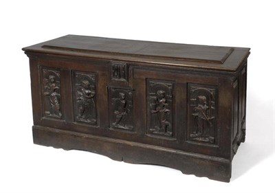 Lot 1398 - A Mid 17th Century Continental Joined Oak Chest, the later hinged lid above an iron lock plate...