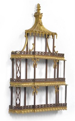 Lot 1416 - A Set of Chippendale Revival Mahogany and Parcel Gilt Three-Tier Hanging Shelves, the pagoda...