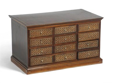 Lot 1422 - A Late 19th Century Colonial Rosewood and Inlaid Specimen Chest, with an arrangement of twelve...