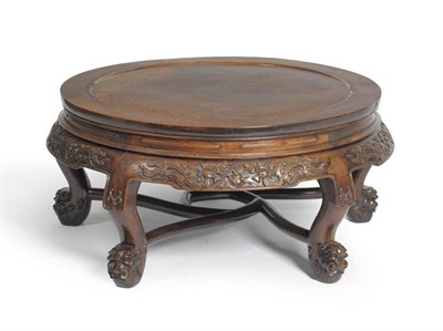 Lot 1428 - A Chinese Hardwood and Burr Elm Circular Low Table, late 19th century, with foliate carved...