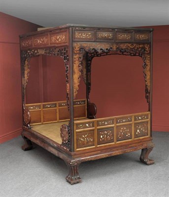 Lot 1433 - A Chinese Hardwood and Rosewood Four Post Canopy Bed, early 20th century, with soft mat top set...