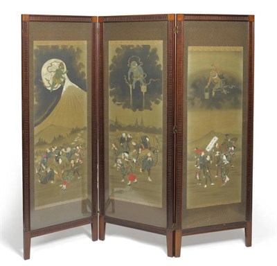 Lot 1437 - An Edwardian Walnut Three-Leaf Screen, early 20th century, the fluted framework containing...