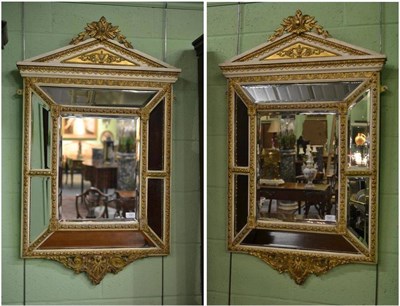 Lot 1441 - A Pair of Victorian Gilt and Gesso Cushion Shaped Wall Mirrors, 3rd quarter 19th century, the...