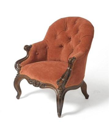 Lot 1452 - A Victorian Child's Walnut Framed Armchair, late 19th century, recovered in pink velvet fabric,...