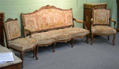 Lot 1457 - A Louis XV Style Walnut and Parcel Gilt Serpentine Shaped Settee, late 19th/early 20th century,...