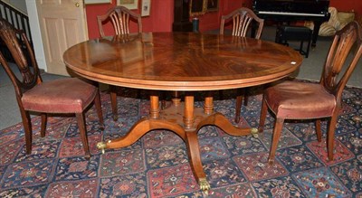 Lot 1463 - A Regency Style Mahogany and Brass Inlaid Circular Dining Table, of recent date, the...