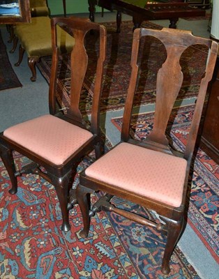 Lot 1482 - A Set of Four Walnut High Back Dining Chairs, circa 1730, with vasiform splat above drop-in...