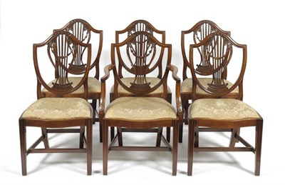 Lot 1483 - A Set of Six George III Mahogany Dining Chairs, late 18th century, the shield shape back...