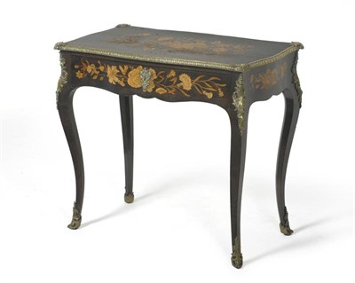 Lot 1486 - A Louis XV Style Ebonised Writing Table, late 19th century, of serpentine shape form, richly inlaid