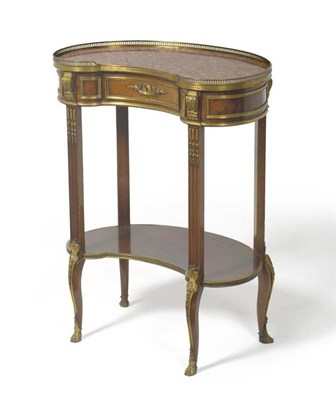 Lot 1487 - A Louis XVI Style Mahogany and Gilt Metal Mounted Gueridon, late 19th century, of kidney shaped...