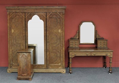 Lot 1497 - An Aesthetic Figured Walnut and Marquetry Triple Door Wardrobe, late 19th century, the...