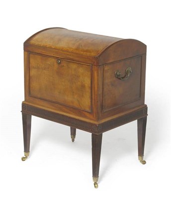 Lot 1502 - A George III Mahogany Cellaret on Stand, by Gillows, circa 1790, the hinged domed lid...