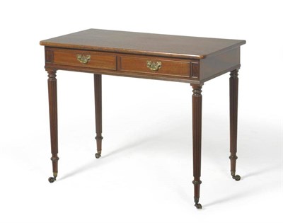 Lot 1503 - A Mahogany Writing Table, in the manner of Gillows, of rounded rectangular form with two frieze...