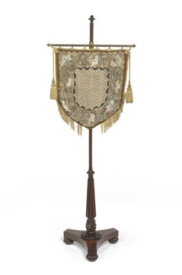 Lot 1508 - A George IV Mahogany Pole Screen, in the manner of Gillows, 2nd quarter 19th century, the brass...