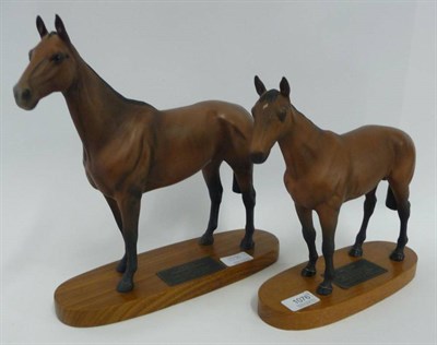 Lot 1076 - Two Beswick Race Horses Arkle, model No. 2065, bay matt, 30.1cm high on wood plinth and Mill...