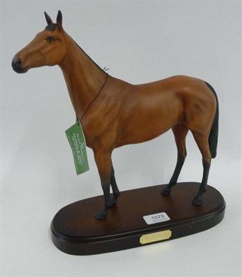 Lot 1078 - Royal Doulton Racehorse 'Red Rum', style one, model No. DA18, bay matt, 31.7cm high on wood...