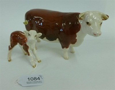 Lot 1084 - A Hereford cow and calf
