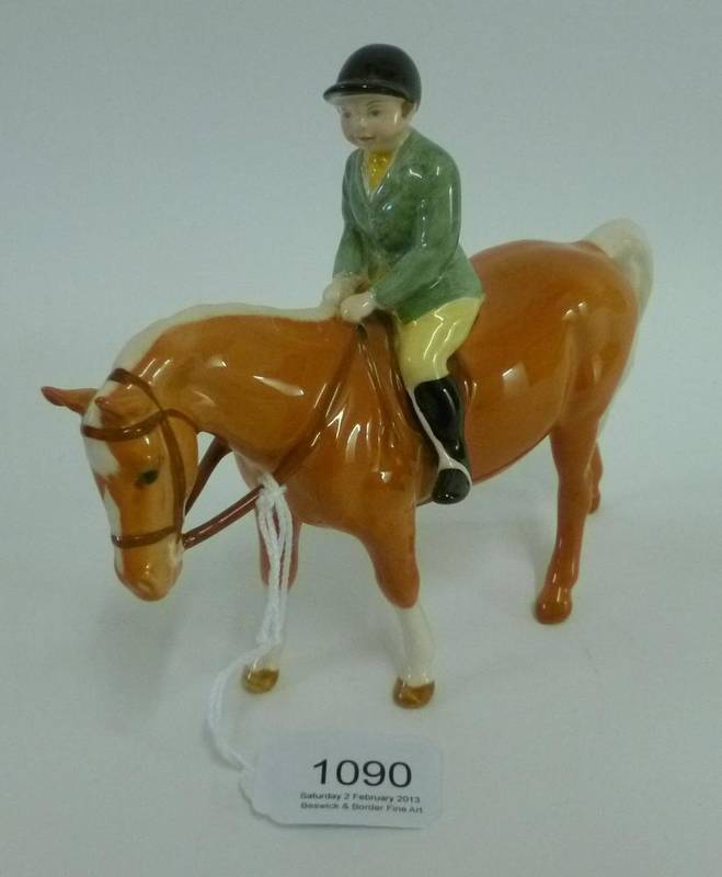 Lot 1090 - Beswick Boy on Palomino Pony, model No. 1500, gloss, 14cm high