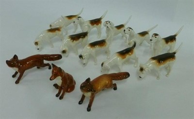 Lot 1092 - Ten Beswick Fox Hounds, models 942; another; 943; 944; 2262; 2263; 2264; another; 2265; another and