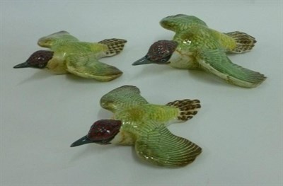 Lot 1095 - Three Beswick Green Woodpecker Wall Plaques graduated set, models 1344/1; 1344/2 and 1344/3, issued