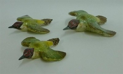 Lot 1103 - Three Beswick Green Woodpecker Wall Plaques graduated set, models 1344/1; 1344/2 and 1344/3, issued