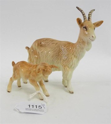Lot 1115 - Beswick Goat and Kid, models 1035 and 1036, both cream and brown gloss (2)