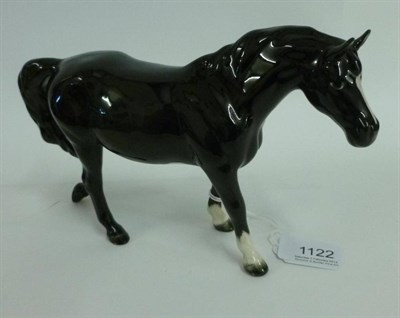 Lot 1122 - Beswick Black Pony, model no. 1516 (spotted walking pony shape), gloss, 13.3cm high (leg restored)