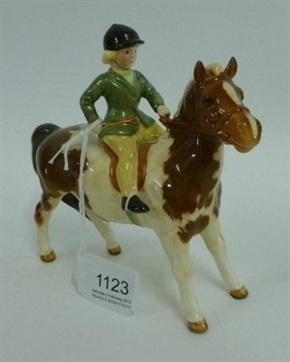 Lot 1123 - Beswick Girl on Skewbald Pony, model No. 1499, gloss, 14cm high