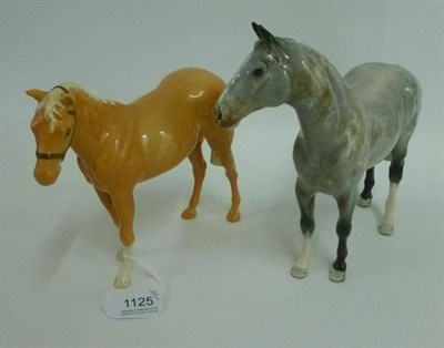 Lot 1125 - Beswick Grey Hunter, model No. H260, gloss, 20.3cm high and Palomino Pony in head collar, model No.