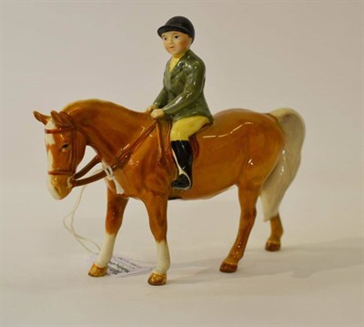 Lot 1132 - Beswick Boy on Palomino Pony, model No. 1500, rider in green jacket looking ahead, gloss, 14cm high