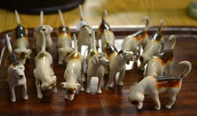 Lot 1173 - A Pack of Fourteen Beswick Foxhounds, various models