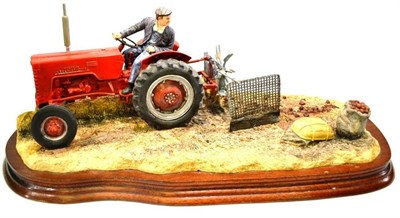 Lot 1046 - Border Fine Arts 'Lifting the Pinks' International B250 tractor, model No. BO219 by Ray Ayres, 14cm