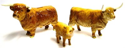 Lot 1128 - Beswick Cattle; Highland Bull, model No. 2008; Highland Cow, model No. 1740; Highland Calf,...