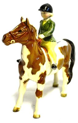 Lot 1134 - Beswick Girl on Skewbald Pony, model No. 1499, gloss