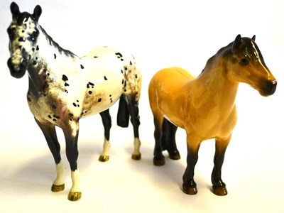 Lot 1137 - Beswick Highland Pony 'Mackionneach', model No. 1644, dun gloss; Beswick Appaloosa Stallion,...