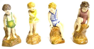 Lot 1151 - Four Royal Doulton Childhood Figures, each modelled as a child stood or sat atop a rock, each...