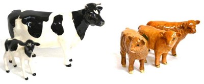 Lot 1059 - Beswick Cattle; Friesian Cow Ch. 'Claybury Leegwater', model no. 1249C, both black and white gloss