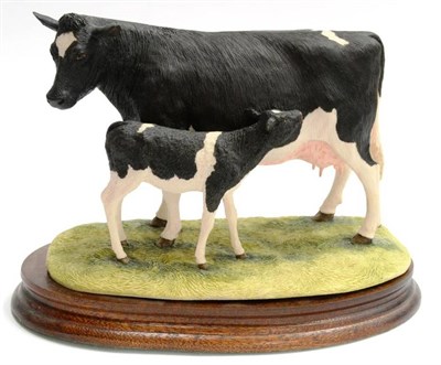 Lot 2006 - Border Fine Arts 'Friesian Cow And Calf', style one, model No. L34 by Ray Ayres, limited...