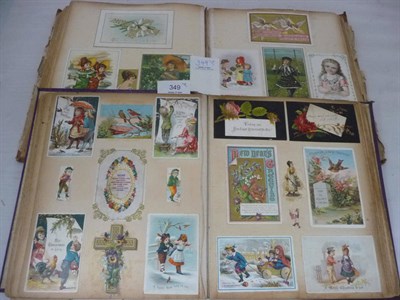 Lot 349 - Two Victorian Scrap Albums, containing  a variety of greetings cards, paper lace valentines and...