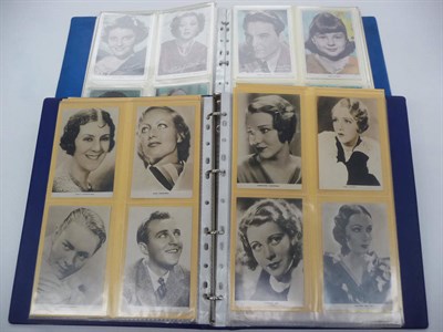 Lot 376 - Film and Stage Stars, an album containing one hundred and ninety seven postcards, in colour and...