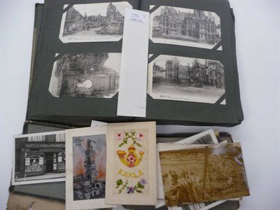 Lot 396 - Two Albums of Pre-war Postcards, including real photographic shop fronts, military and construction