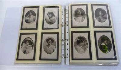 Lot 235 - Edwardian Actors and Actresses, two albums containing two hundred and sixty seven postcards,...