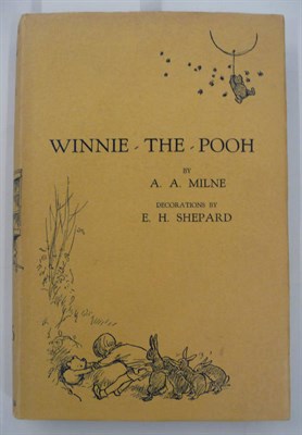 Lot 15 - Milne (A.A.) Winnie-The-Pooh, 1928, seventh edition, t.e.g., dust wrapper