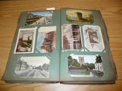 Lot 227 - An Edwardian Postcard Album, containing approximately five hundred pre-war cards, including...